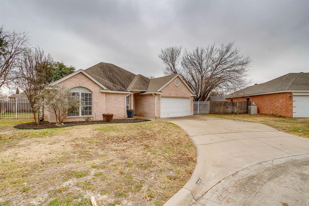177 Aspen Loop Aledo, TX 76008 - Photo 2 of 40 a front view of a house with a yard and garage