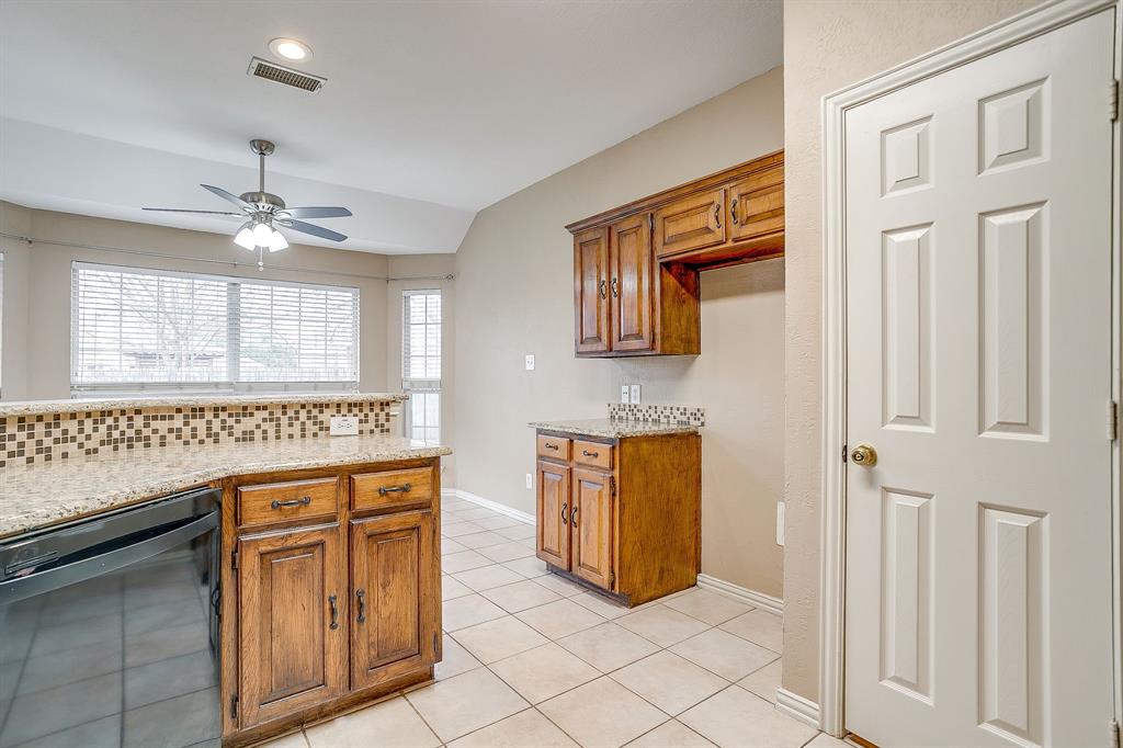177 Aspen Loop Aledo, TX 76008 - Photo 6 of 40 a bathroom with a sink a vanity and a mirror