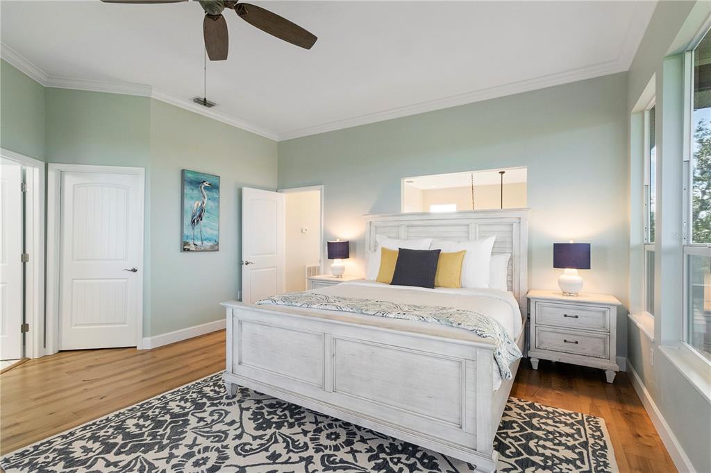7325 Holly Road Terra Ceia, FL 34250 - Photo 33 of 87 a room that has a bed and a window in it