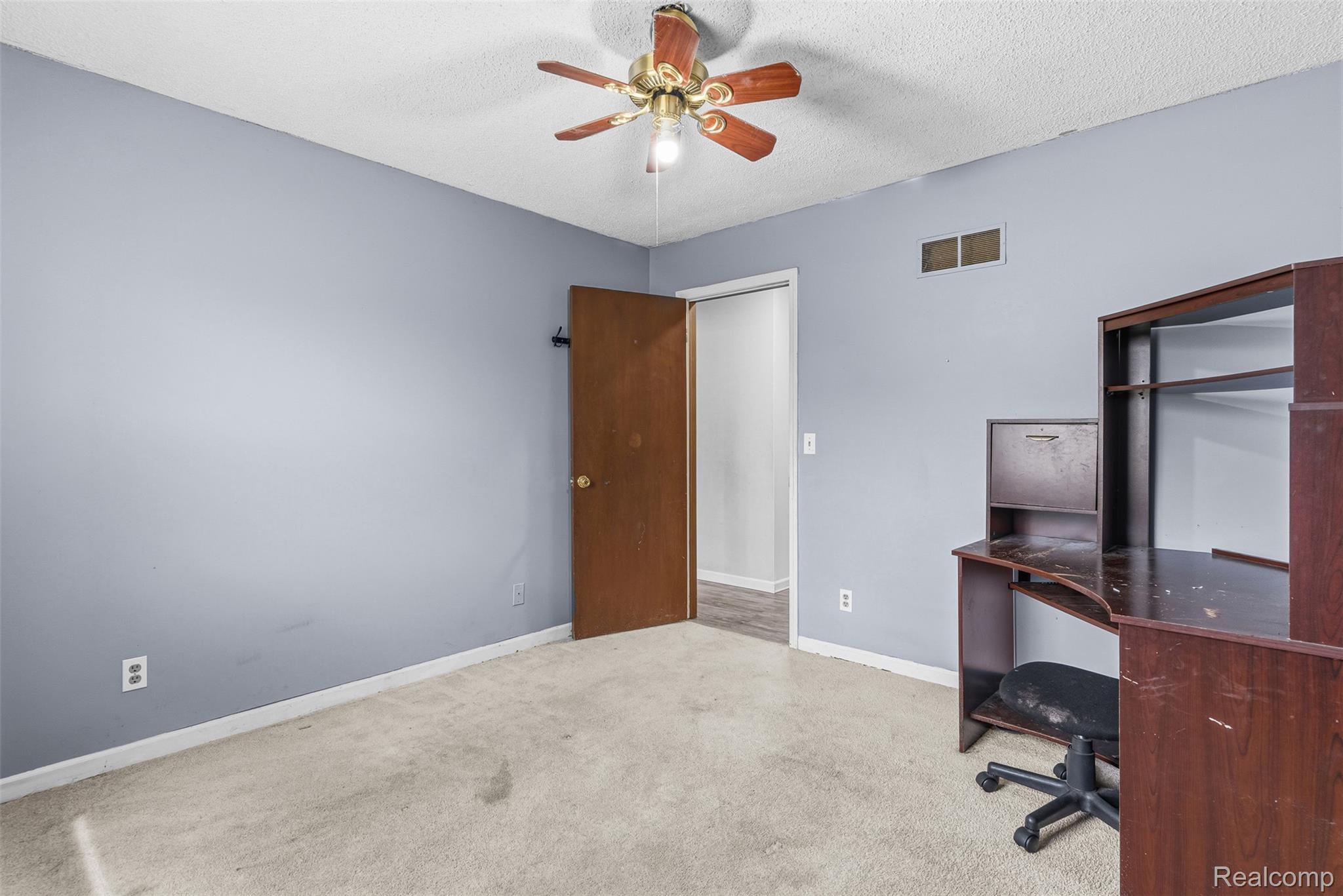 3432 South State Road Davison, MI 48423 - Photo 16 of 58 Unfurnished office featuring carpet flooring, a ceiling fan, and a textured ceiling