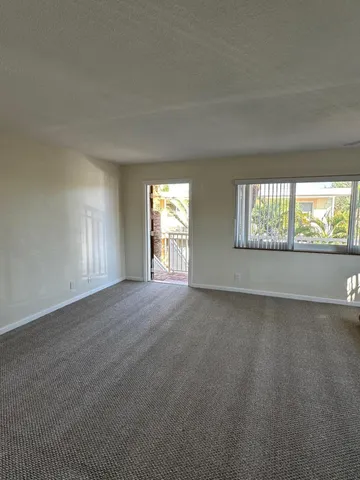 a view of a building with a street