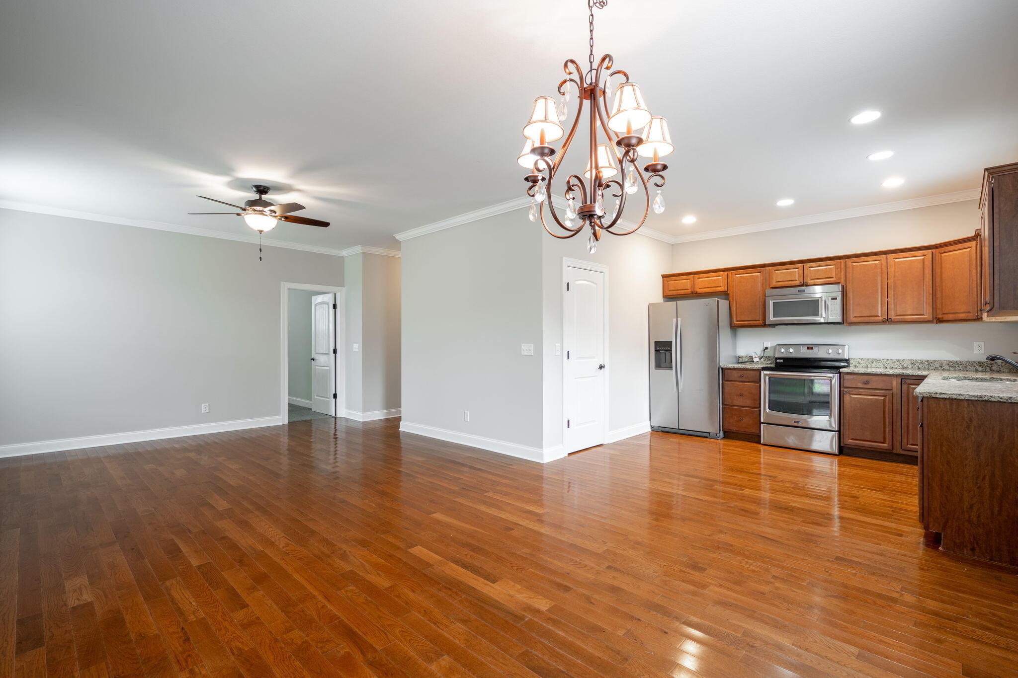 140 Fieldstone Cmns Rock Spring, GA 30739 - Photo 16 of 26 Living Room and Kitchen