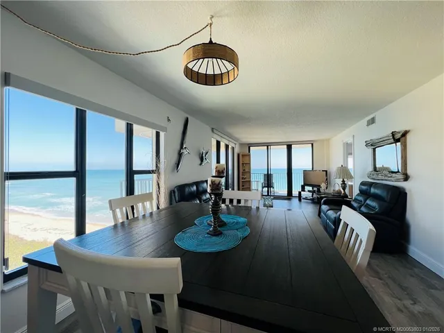 a view of a dining room with furniture