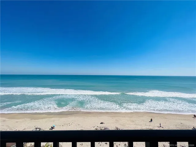 a view of an ocean from a balcony