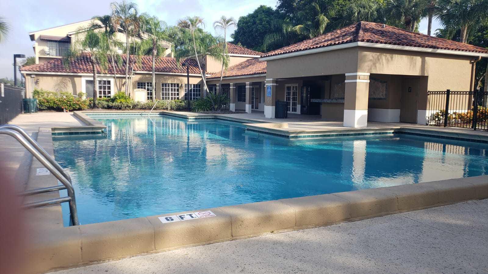 1179 Benoist Farms Road, Unit 102 West Palm Beach, FL 33411 - Photo 17 of 19 Pool St Andrews