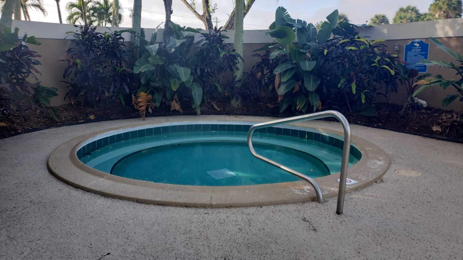 1179 Benoist Farms Road, Unit 102 West Palm Beach, FL 33411 - Photo 18 of 19 Jacuzzi St Andrews