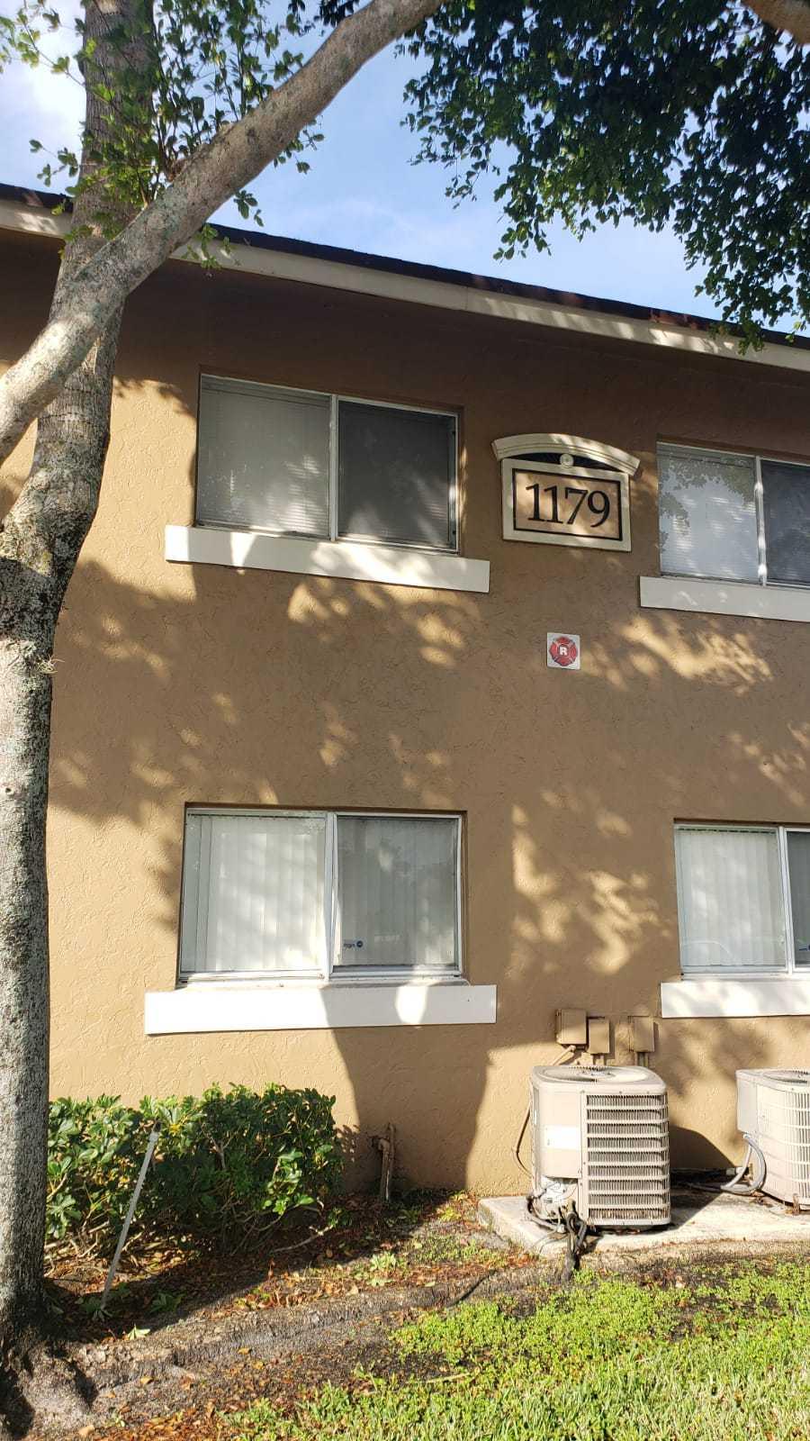 1179 Benoist Farms Road, Unit 102 West Palm Beach, FL 33411 - Photo 2 of 19 Front St Andrews