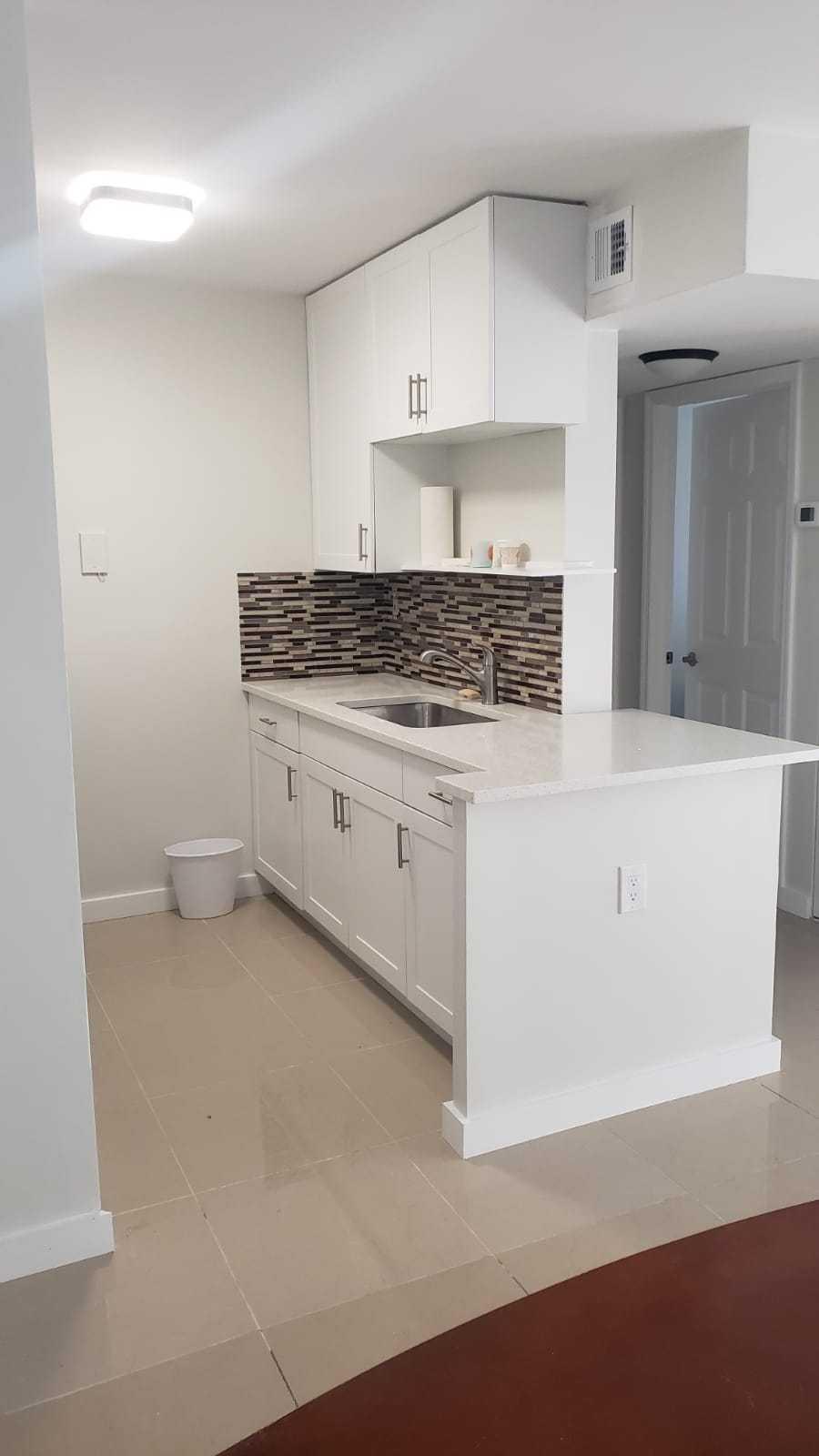 1179 Benoist Farms Road, Unit 102 West Palm Beach, FL 33411 - Photo 7 of 19 Kitchen 2 St Andrews