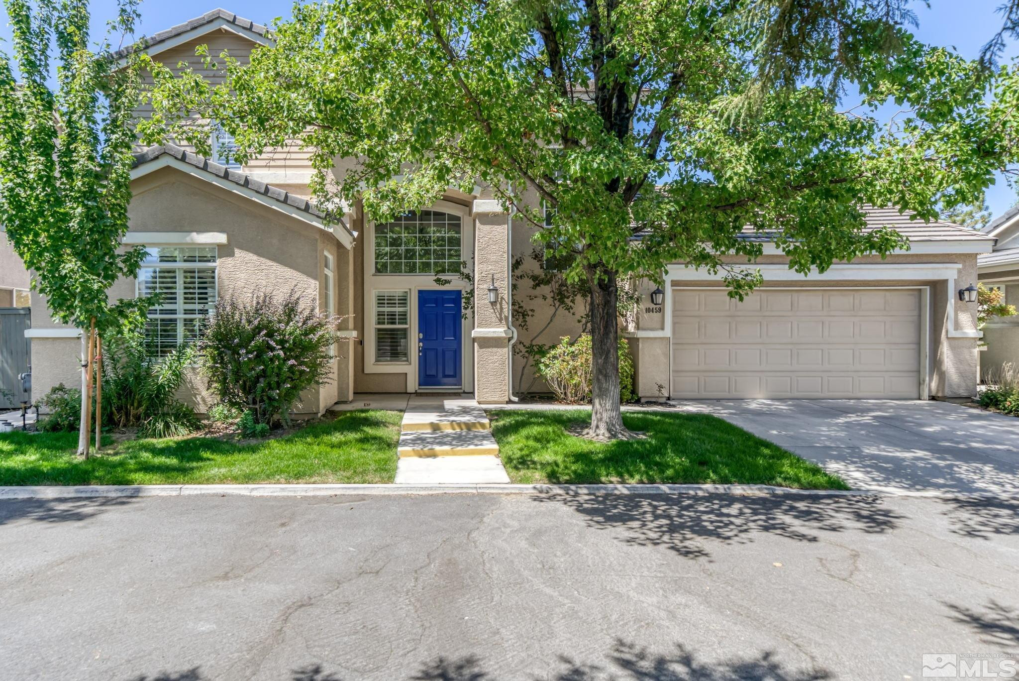 10459 Summershade Lane Reno, NV 89521 - Photo 2 of 37 a front view of house with yard and green space