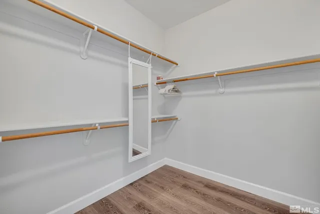 a view of an empty walk in closet
