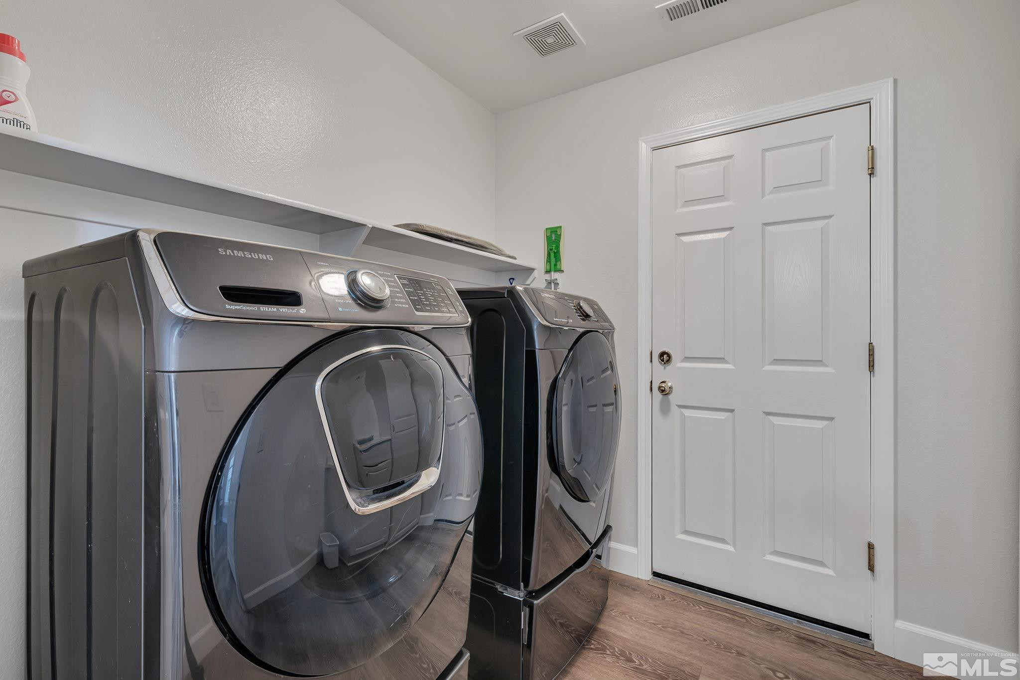 10459 Summershade Lane Reno, NV 89521 - Photo 32 of 37 a utility room with dryer and washer