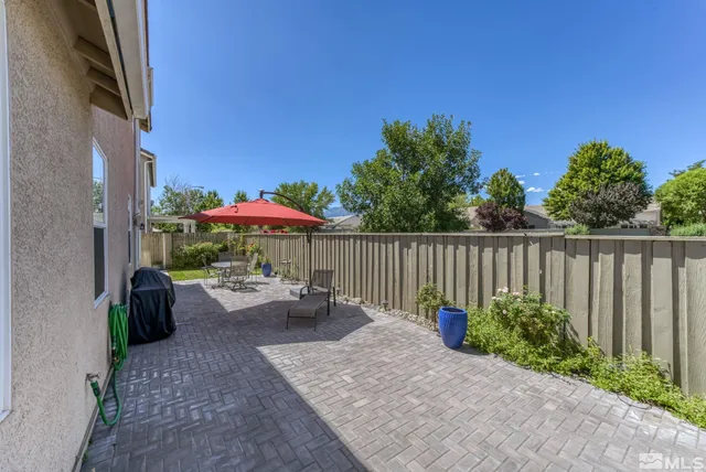 a garden view with a seating space
