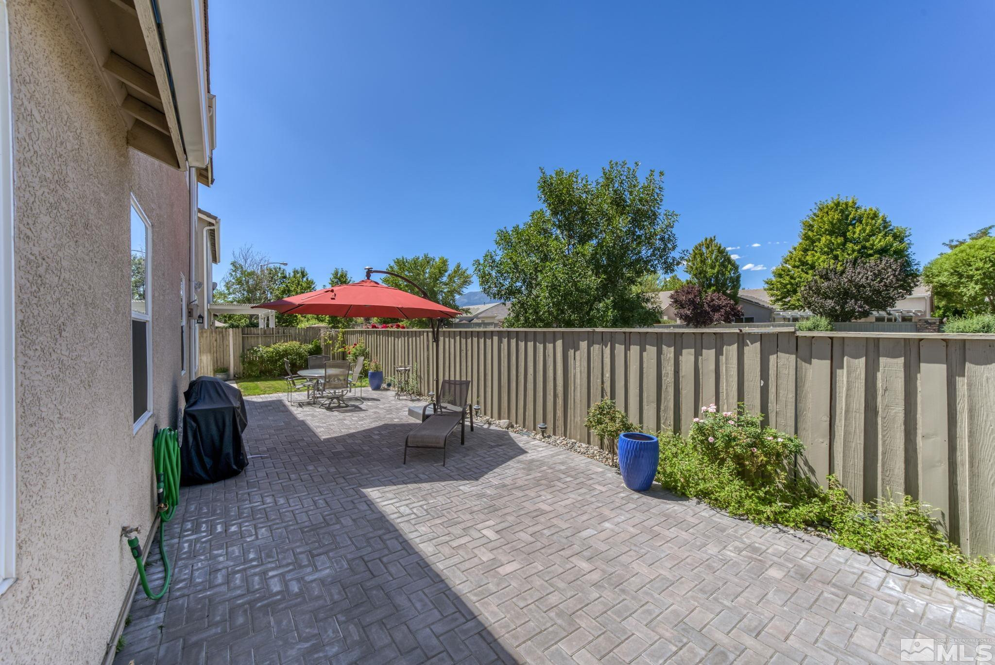 10459 Summershade Lane Reno, NV 89521 - Photo 36 of 37 a garden view with a seating space
