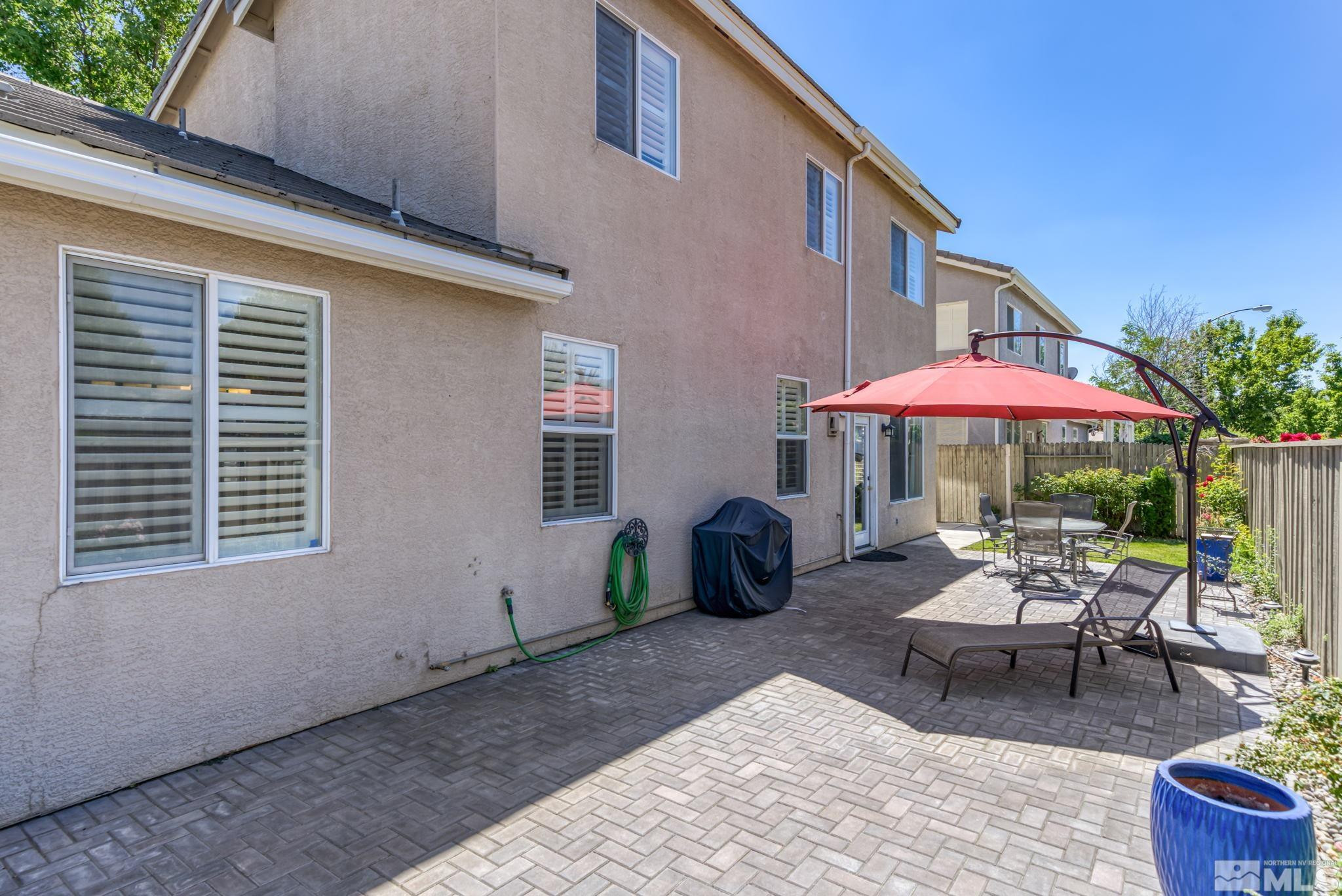 10459 Summershade Lane Reno, NV 89521 - Photo 37 of 37 a backyard view with a seating space