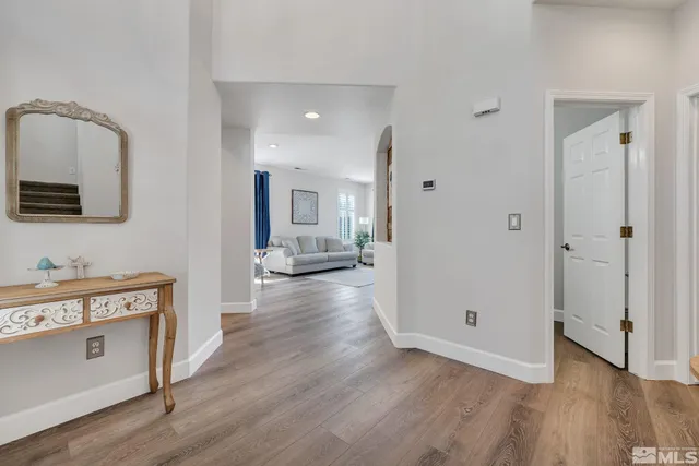 a view of a kitchen cabinets and wooden floor
