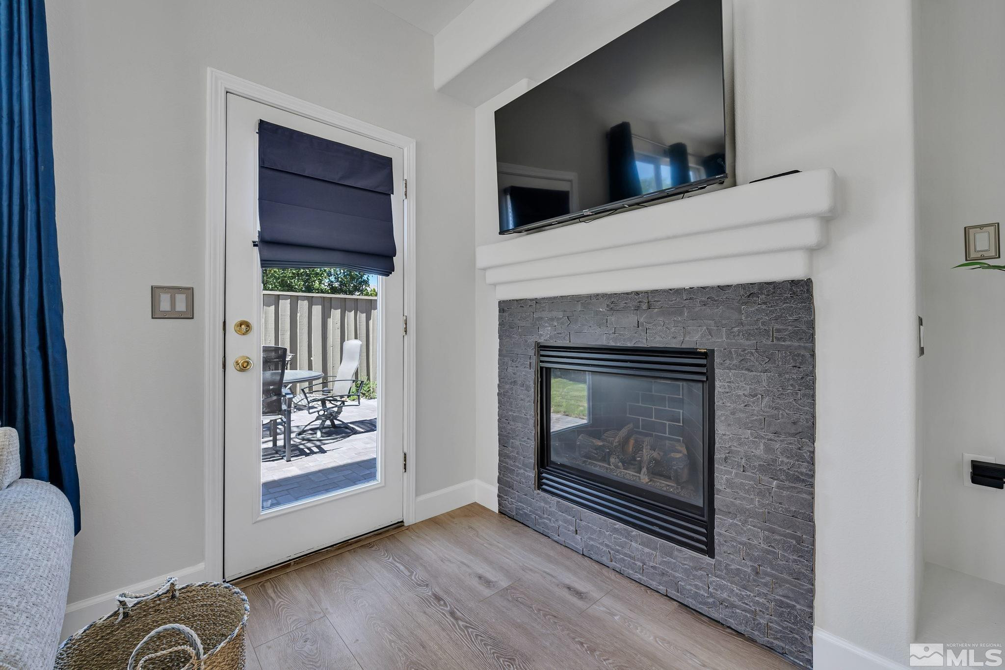 10459 Summershade Lane Reno, NV 89521 - Photo 9 of 37 a living room with furniture and a fireplace