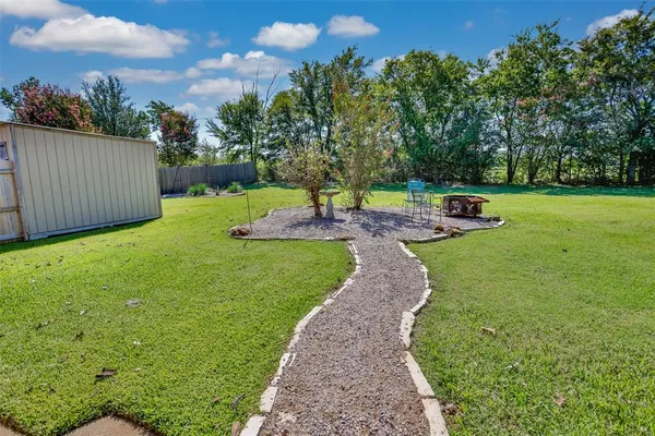 a view of an outdoor space and a yard
