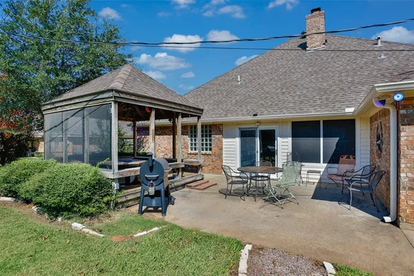 a house view with outdoor seating space