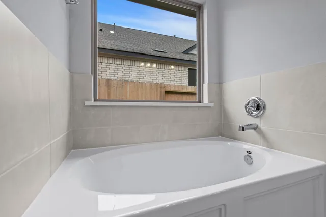 a bathroom with a bathtub