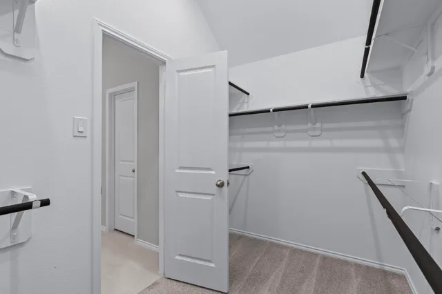 a view of small space with racks on the wall