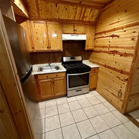 a utility room with washer and dryer