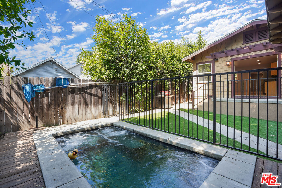 910 Bell Street Pasadena, CA 91104 - Photo 11 of 32 a view of a wrought iron fences in front of house