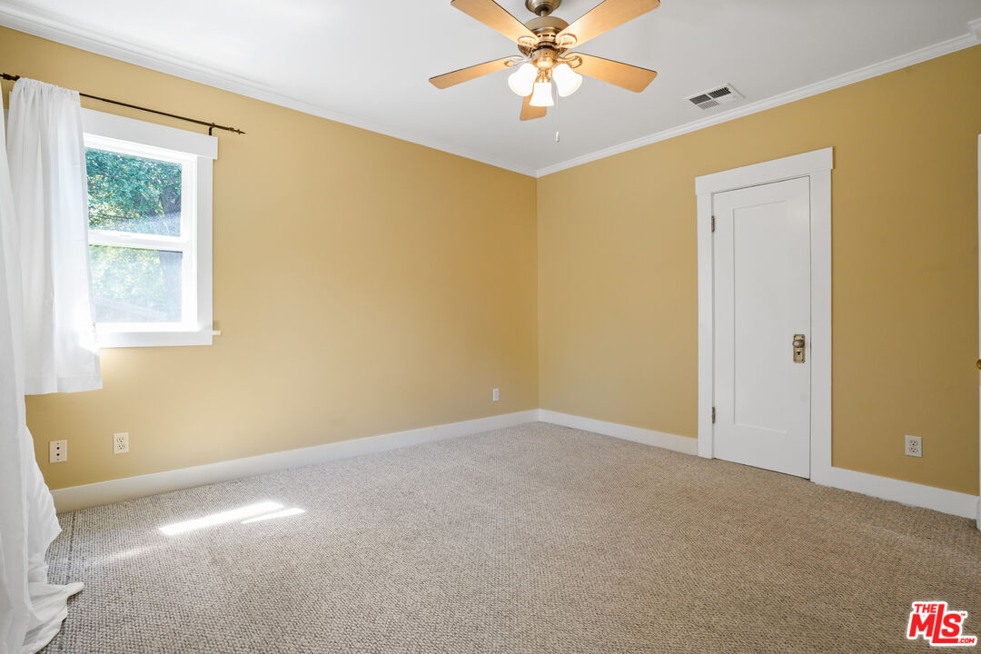 910 Bell Street Pasadena, CA 91104 - Photo 20 of 32 a view of an empty room with a window