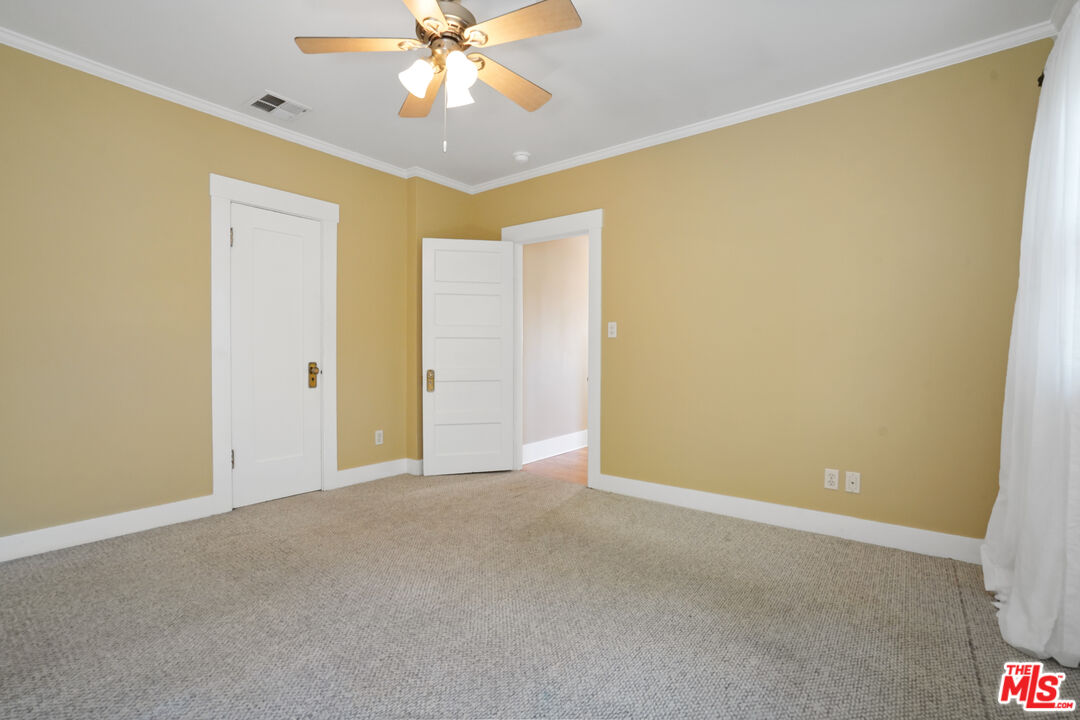 910 Bell Street Pasadena, CA 91104 - Photo 21 of 32 a view of an empty room with a window