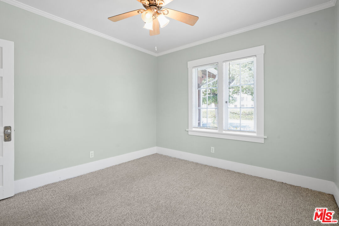 910 Bell Street Pasadena, CA 91104 - Photo 27 of 32 an empty room with a window