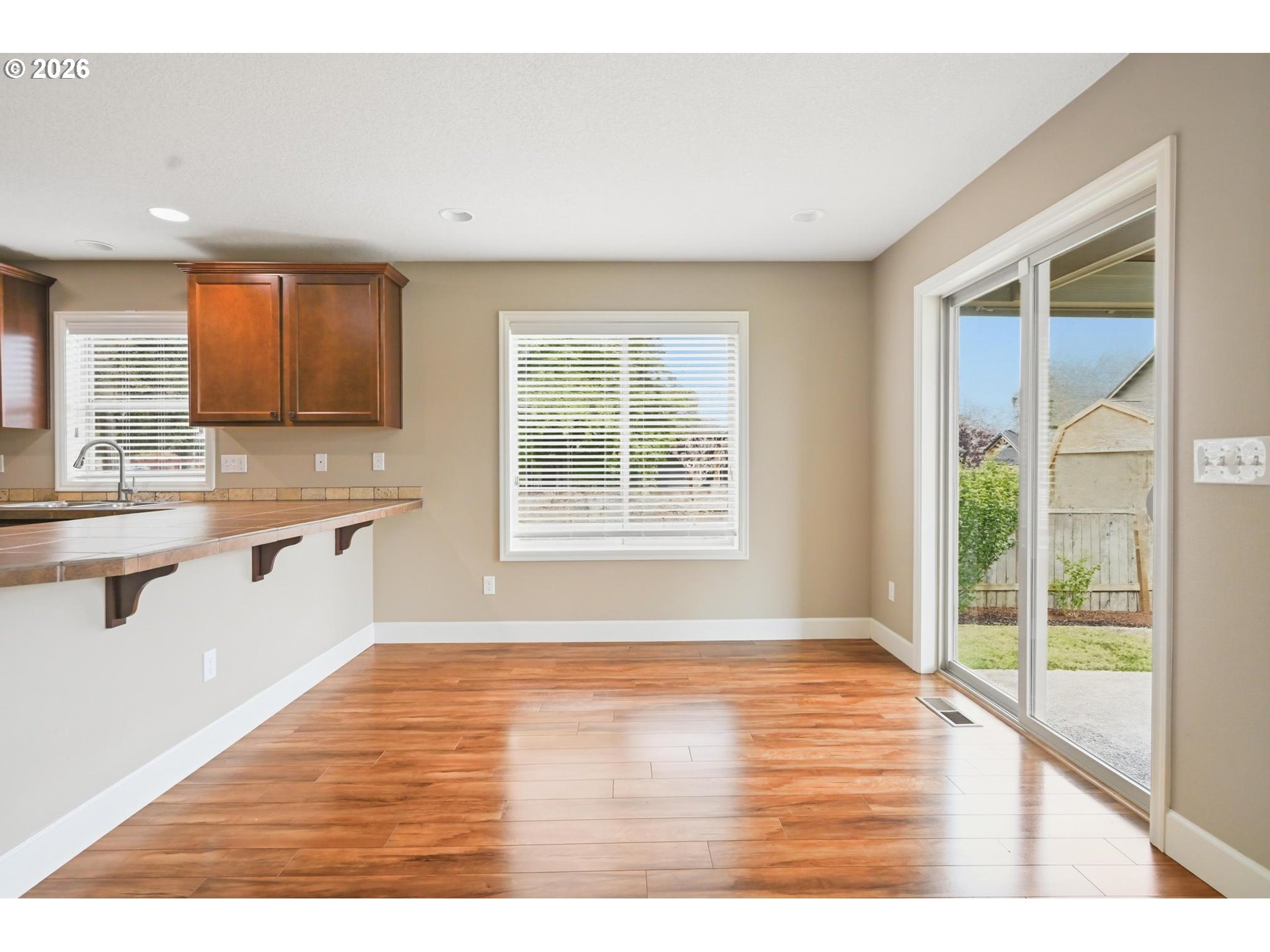 1075 Sage Street Silverton, OR 97381 - Photo 33 of 46 a view of a kitchen with wooden floor and a window