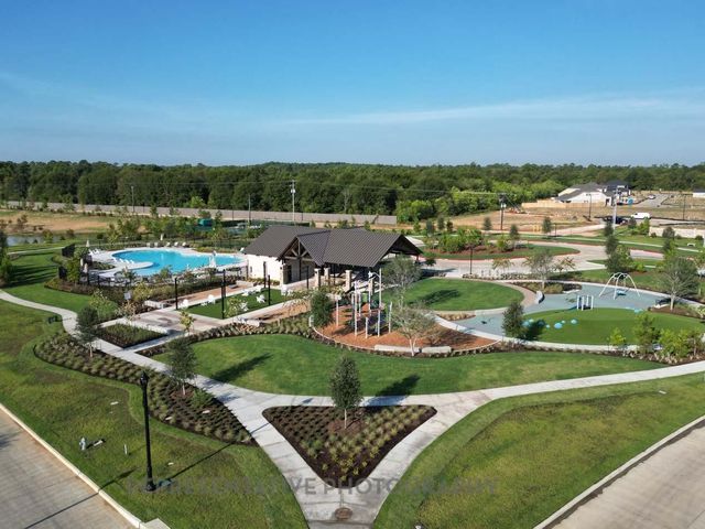 an aerial view of a house with a garden