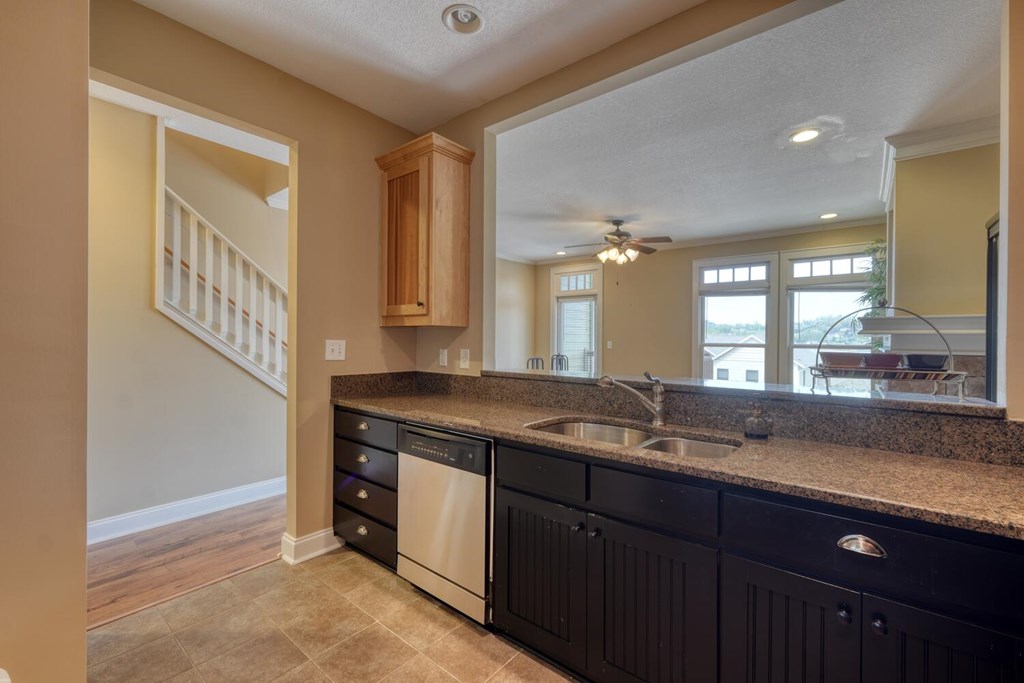 1401 Lakeside Road Hiawassee, GA 30546 - Photo 11 of 46 a bathroom with a granite countertop sink and a mirror