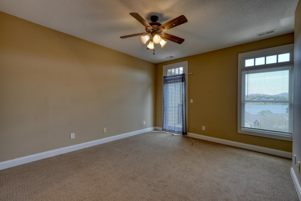 1401 Lakeside Road Hiawassee, GA 30546 - Photo 14 of 46 a view of an empty room with a window
