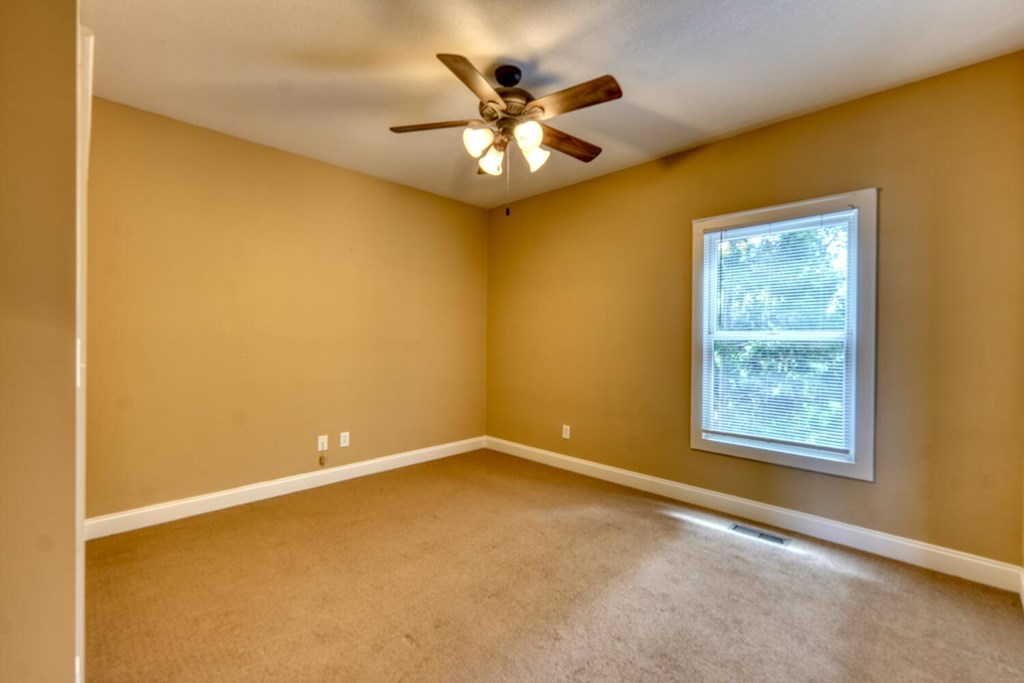 1401 Lakeside Road Hiawassee, GA 30546 - Photo 23 of 46 a view of an empty room with a window
