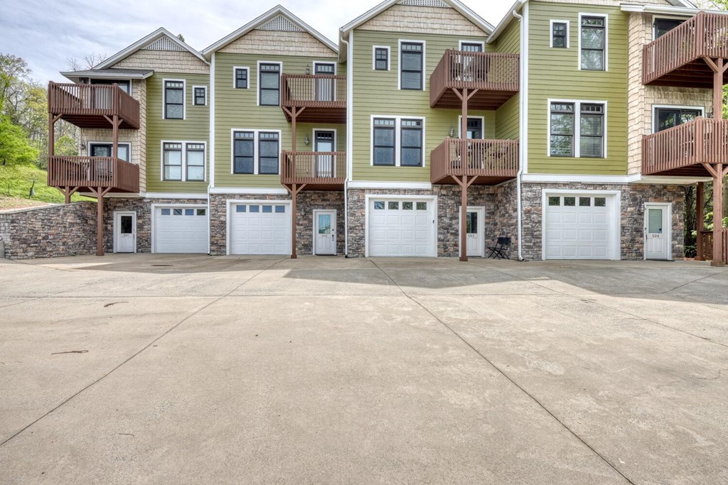 1401 Lakeside Road Hiawassee, GA 30546 - Photo 29 of 46 a view of a brick building with many windows