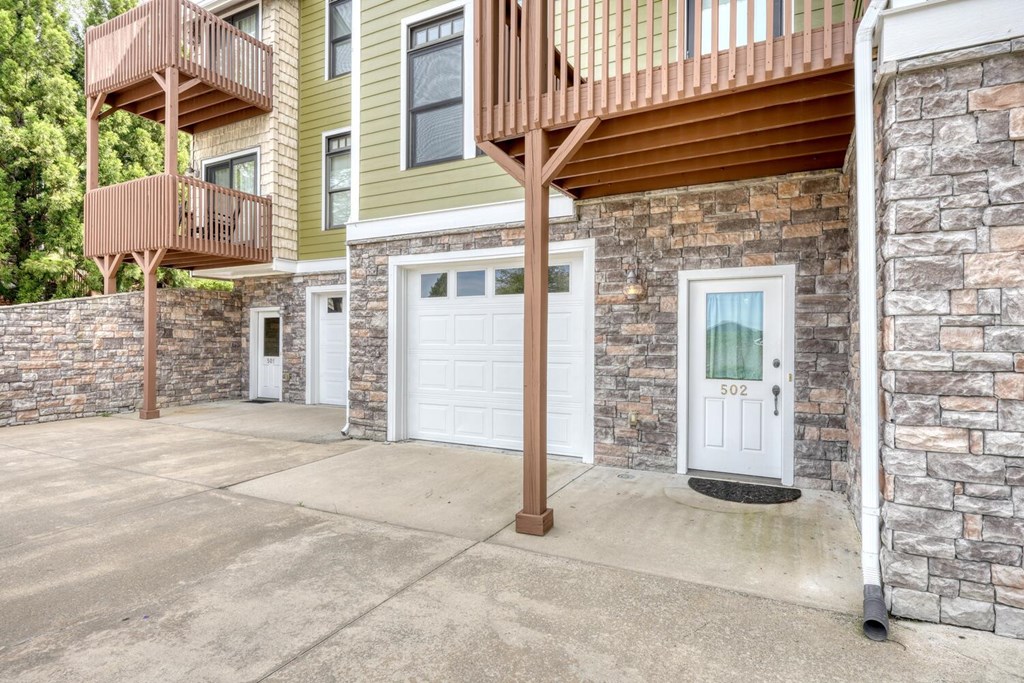 1401 Lakeside Road Hiawassee, GA 30546 - Photo 30 of 46 front view of a house with a outdoor space