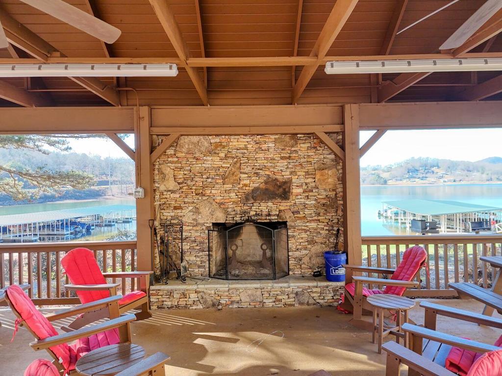 1401 Lakeside Road Hiawassee, GA 30546 - Photo 8 of 46 a building outdoor space with patio furniture and potted plants