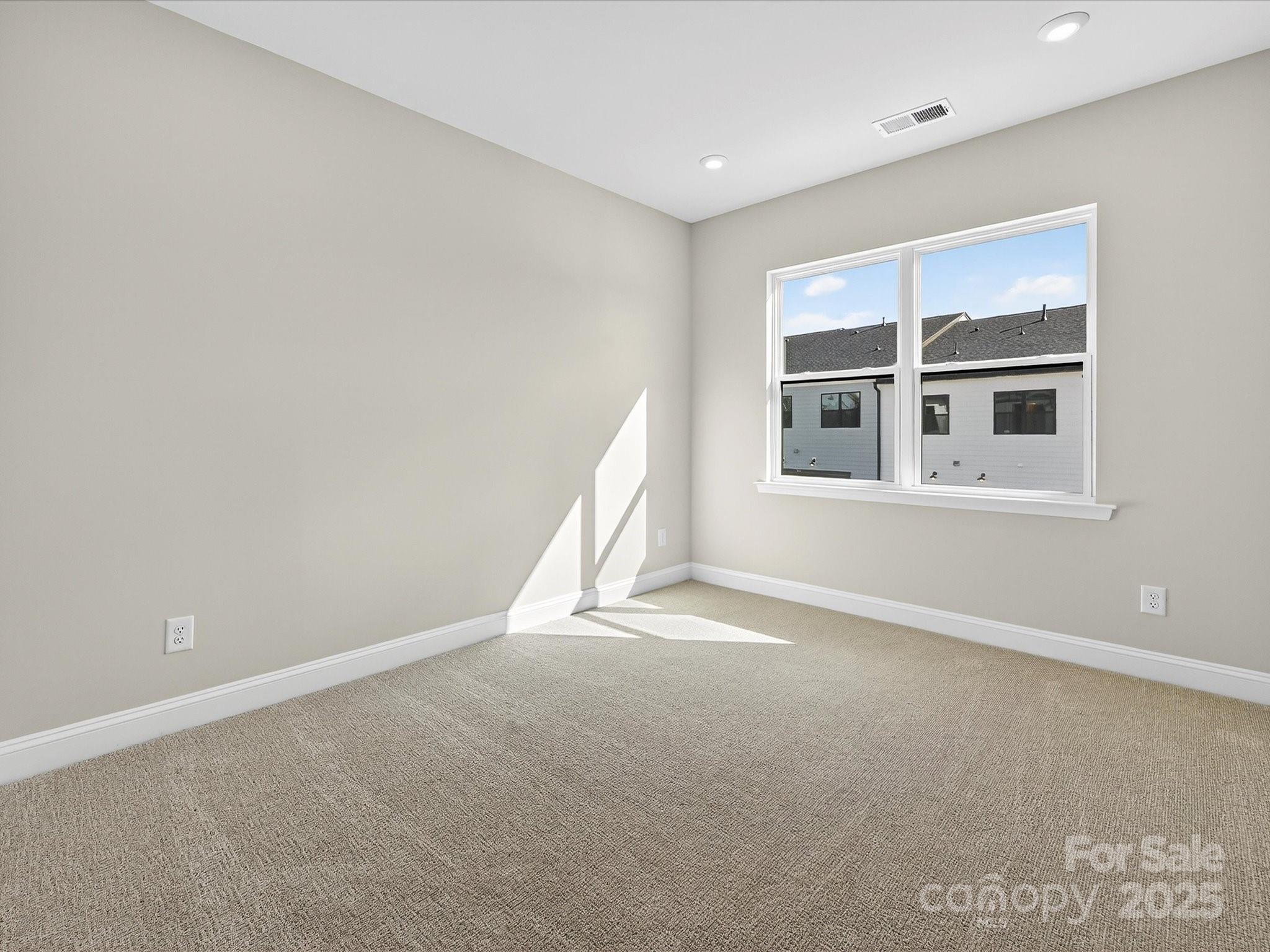 489 Nash Street Fort Mill, SC 29715 - Photo 18 of 24 an empty room with a window