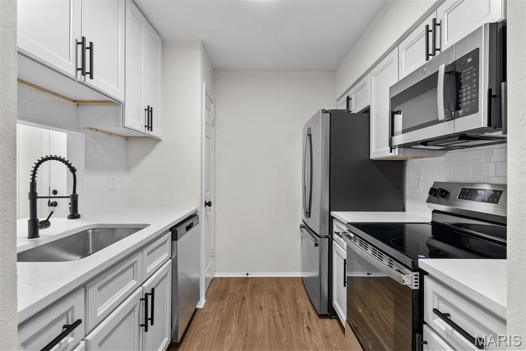 6808 Cottage Grove Lane, Unit I St. Louis, MO 63129 - Photo 13 of 33