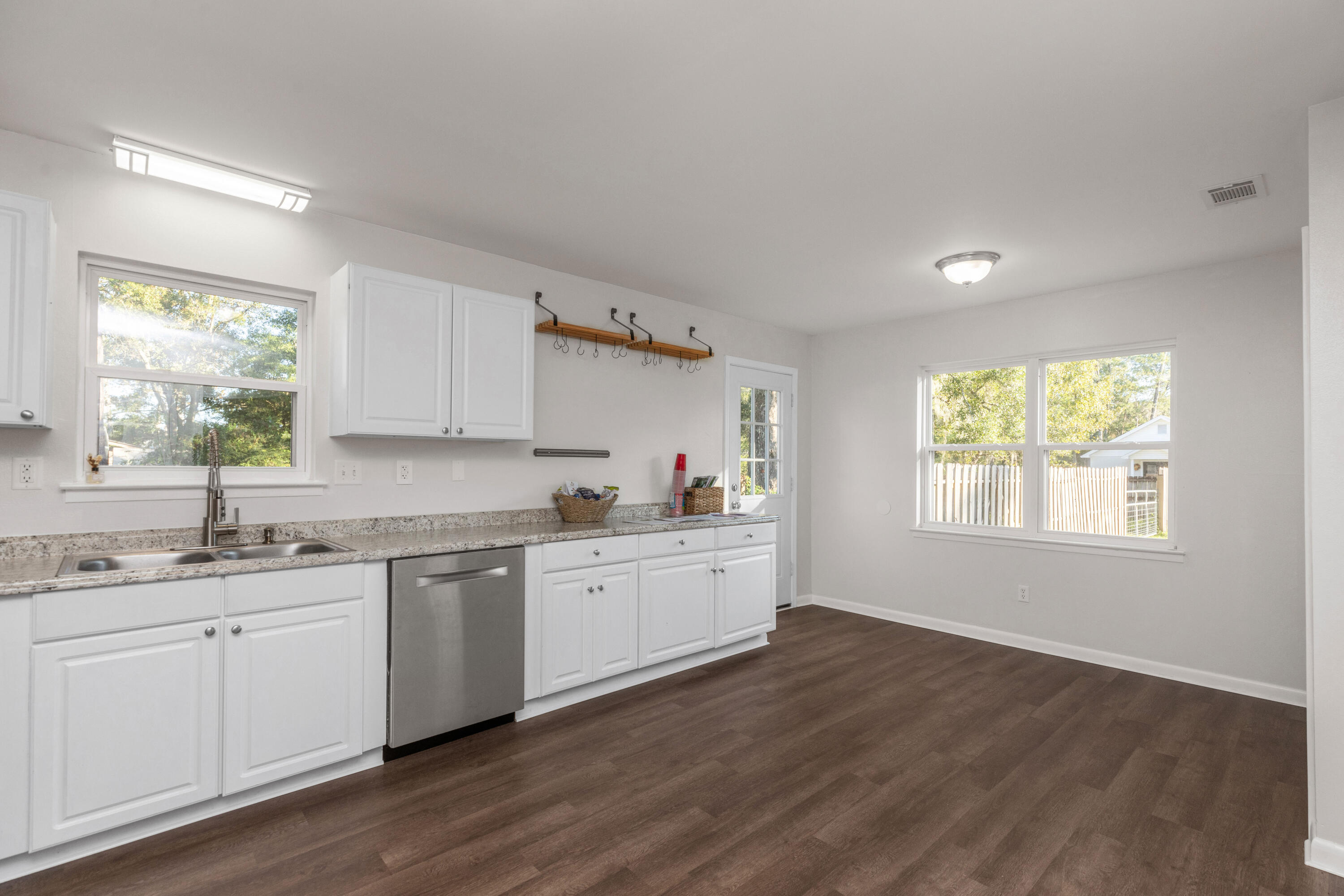 229 Madison Street Freeport, FL 32439 - Photo 15 of 44 a kitchen with sink cabinets and window
