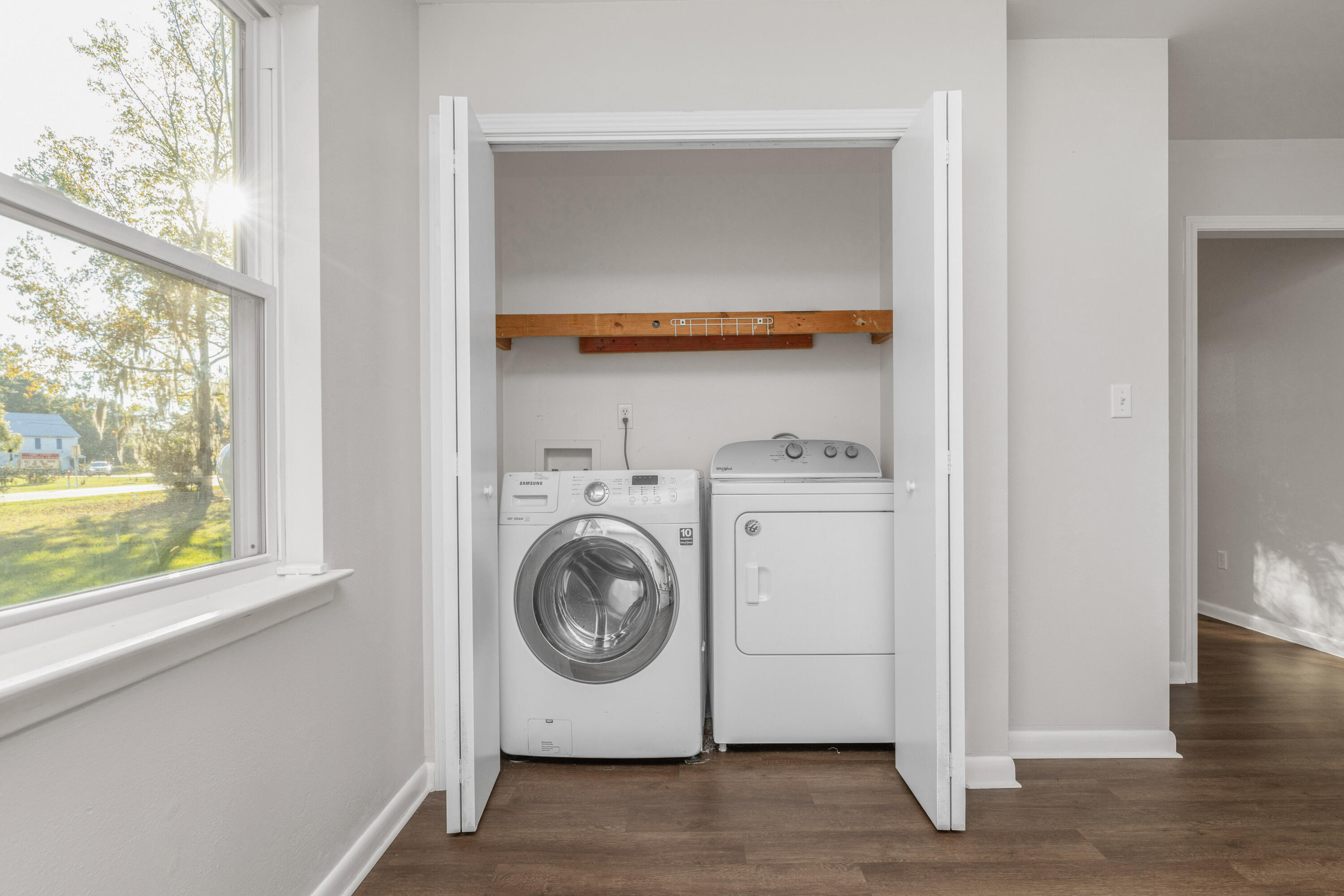 229 Madison Street Freeport, FL 32439 - Photo 17 of 44 a utility room with dryer and washer