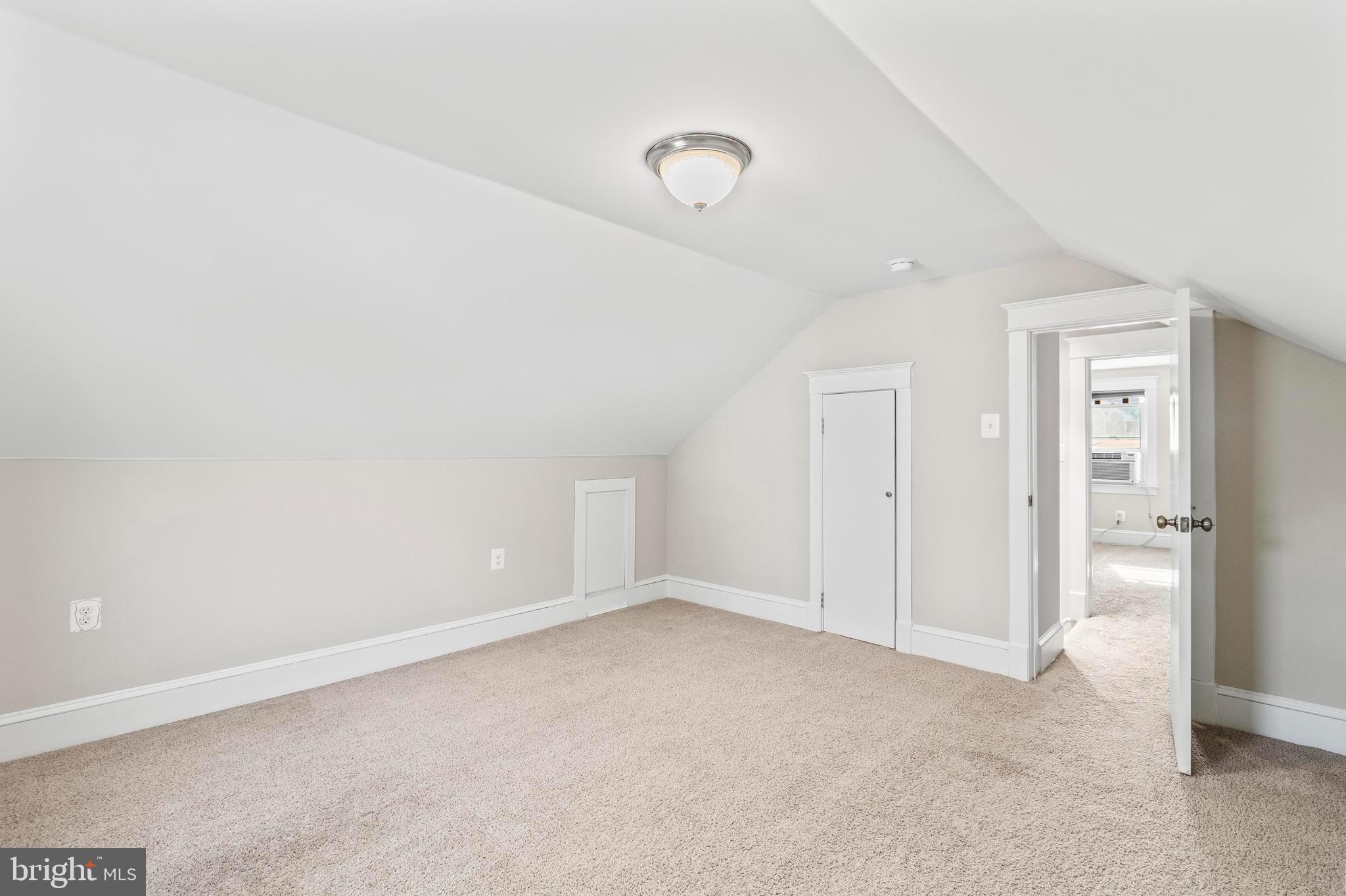 9005 Fairground Road Bel Alton, MD 20611 - Photo 18 of 54 an empty room with a empty space and windows