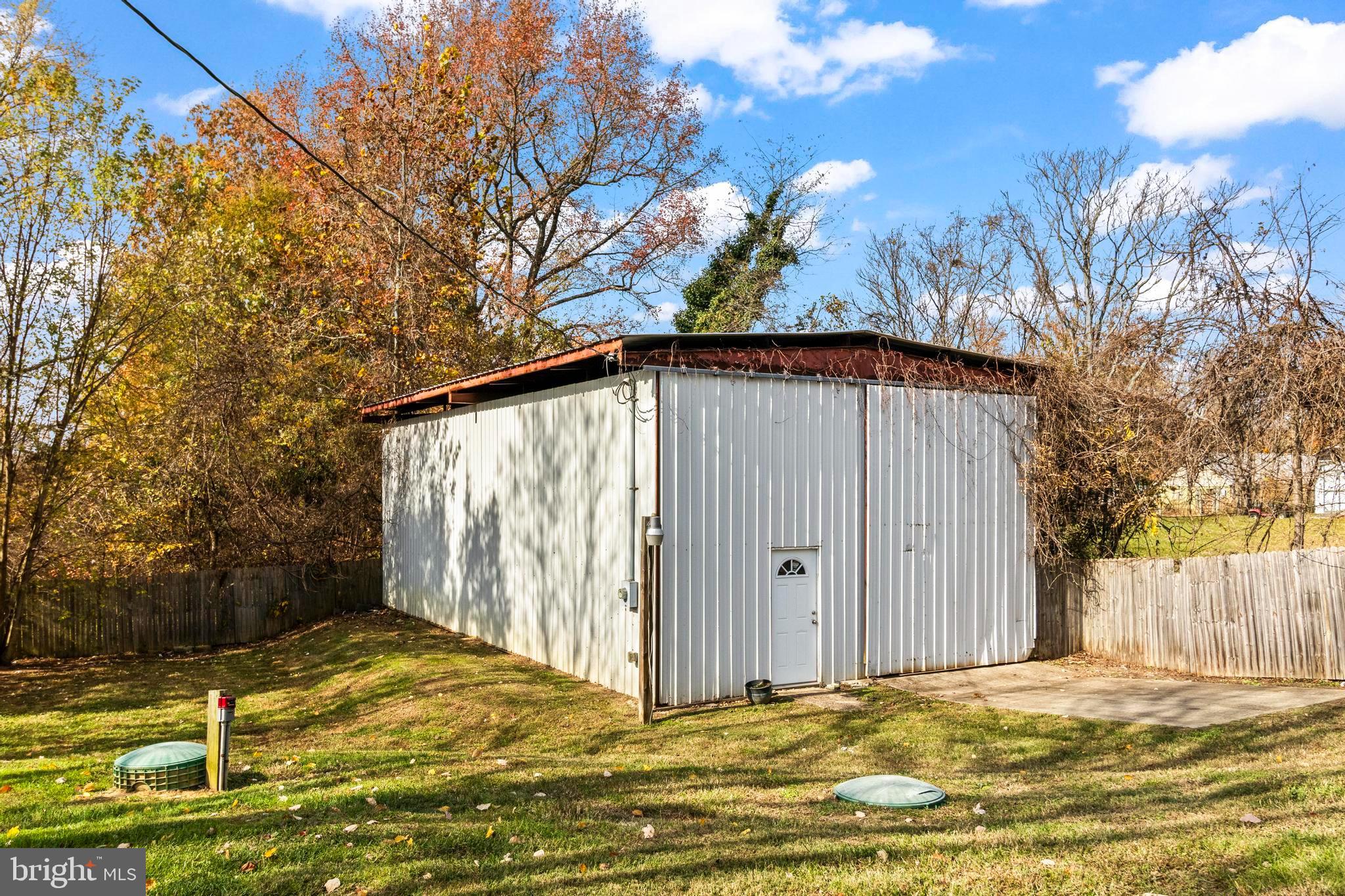 9005 Fairground Road Bel Alton, MD 20611 - Photo 37 of 54 a view of a backyard of house