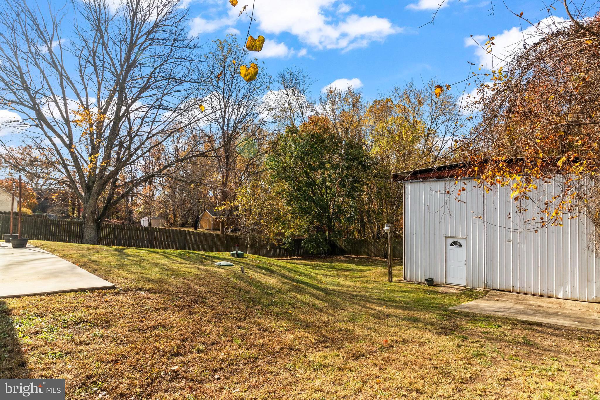 9005 Fairground Road Bel Alton, MD 20611 - Photo 40 of 54 a view of a house with snow on the trees
