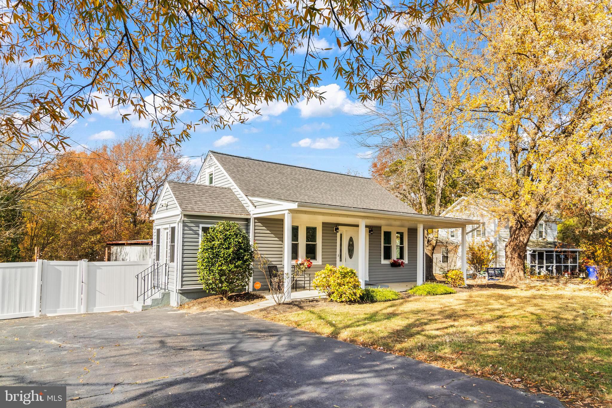 9005 Fairground Road Bel Alton, MD 20611 - Photo 4 of 54 a view of a house with a tree tree front of house
