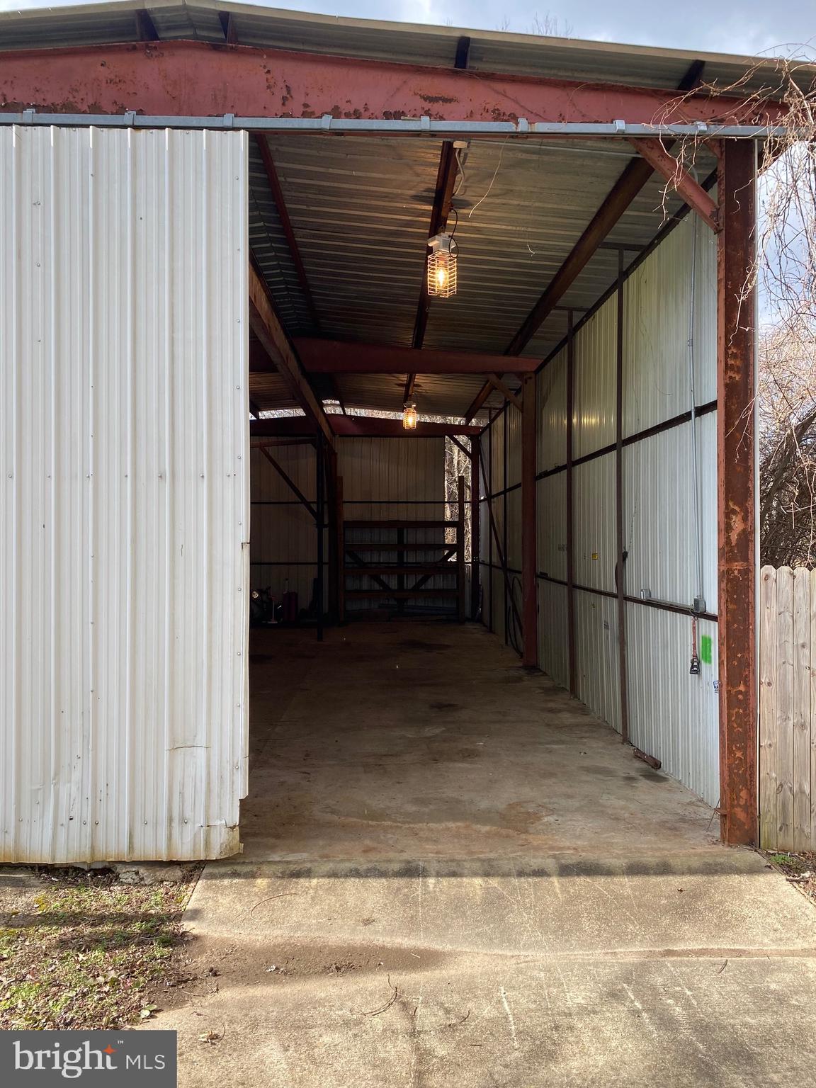 9005 Fairground Road Bel Alton, MD 20611 - Photo 48 of 54 a view of a room with wooden walls