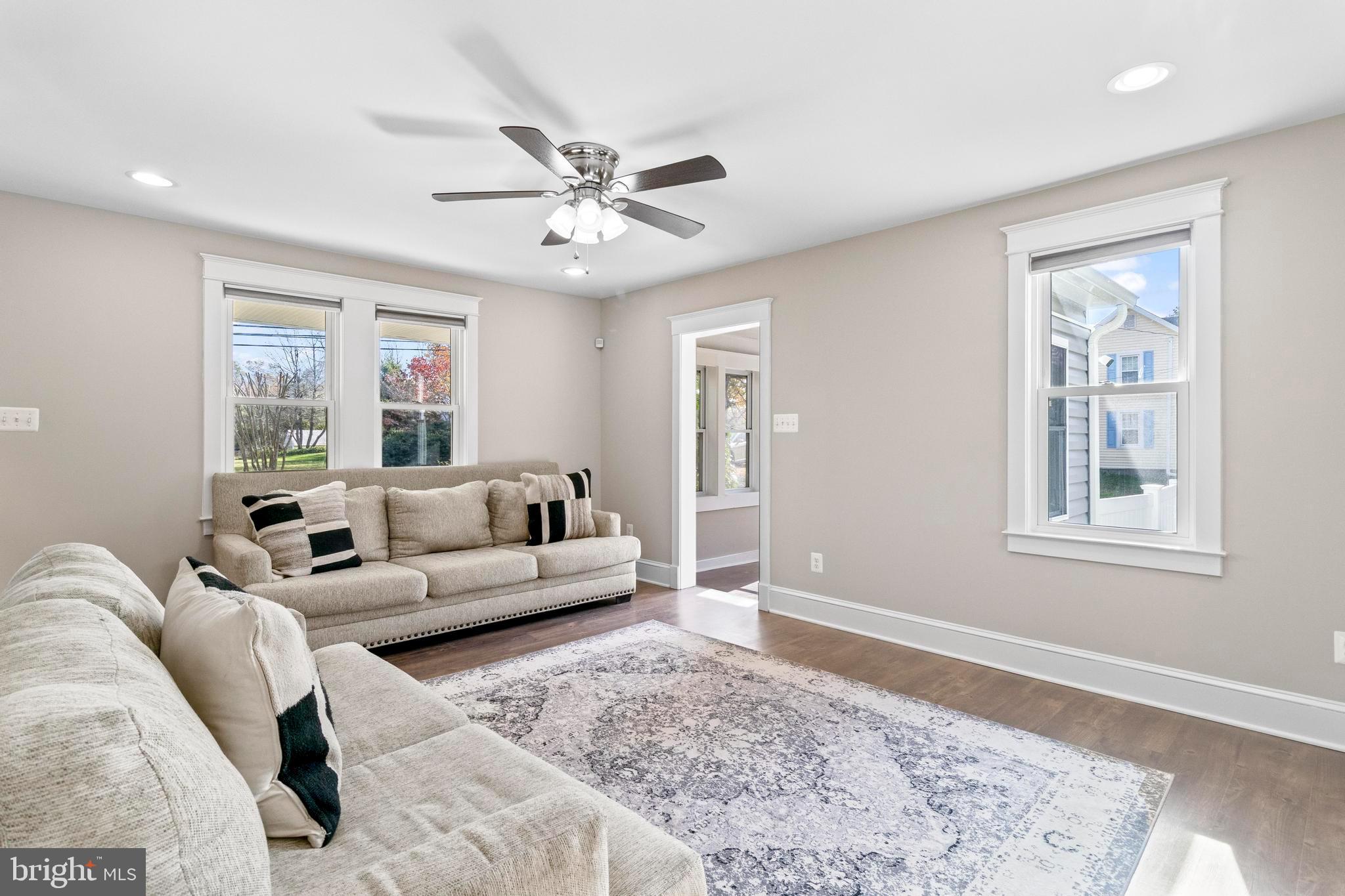 9005 Fairground Road Bel Alton, MD 20611 - Photo 6 of 54 a living room with furniture and a rug