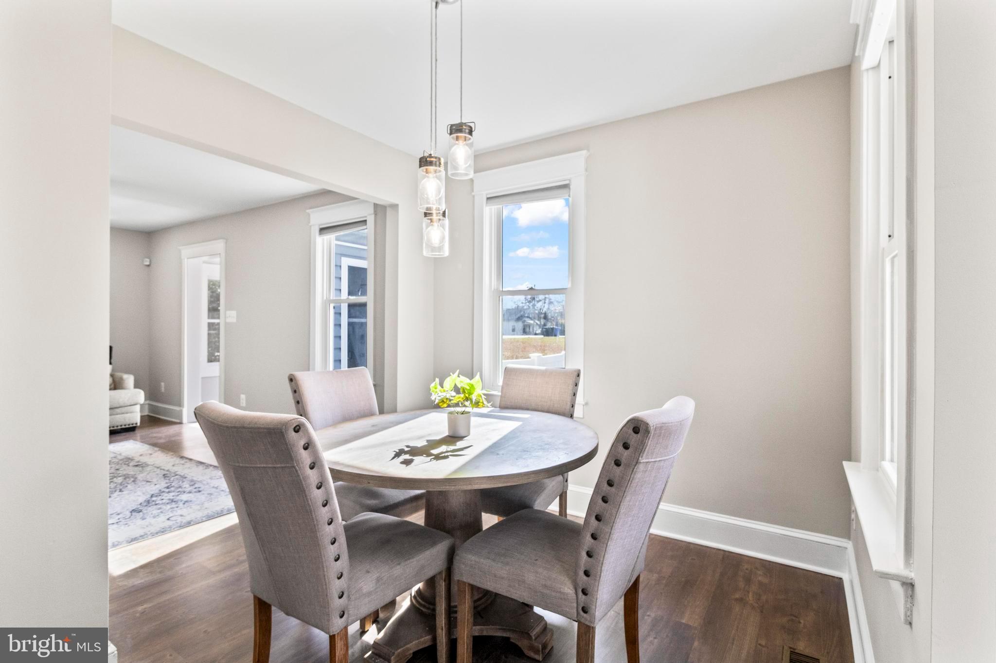 9005 Fairground Road Bel Alton, MD 20611 - Photo 10 of 54 a view of a dining room with furniture window and outside view