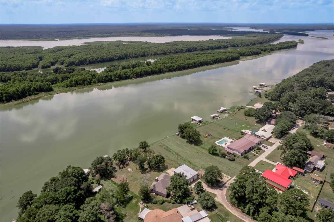 206 Lake Front Drive Trinity, TX 75862 - Photo 14 of 48 an aerial view of a house with a lake view