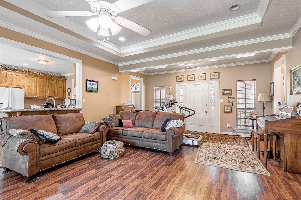 206 Lake Front Drive Trinity, TX 75862 - Photo 17 of 48 a living room with furniture and a wooden floor